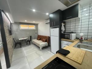 Kuchnia lub aneks kuchenny w obiekcie Benidorm JL 1 y 2