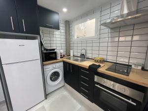 Kuchnia lub aneks kuchenny w obiekcie Benidorm JL 1 y 2