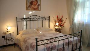 Postel nebo postele na pokoji v ubytování B&B Villa Sitrie