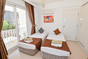 Ένα ή περισσότερα κρεβάτια σε δωμάτιο στο Villa Tia +55 φωτογραφίες
