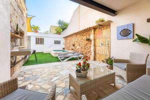 A seating area at Holiday Home S'Abellar