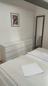 Postel nebo postele na pokoji v ubytování Apartments Suri