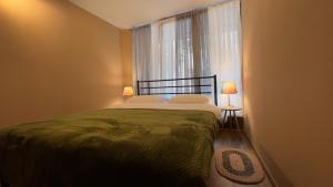 Postel nebo postele na pokoji v ubytování Hostel Nomad