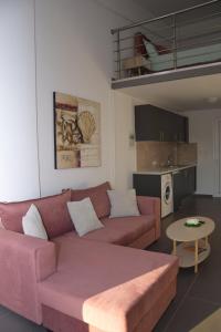 Kuchyň nebo kuchyňský kout v ubytování Olympia Suites