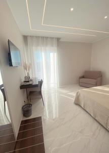 Katil atau katil-katil dalam bilik di Meligrana Central Rooms