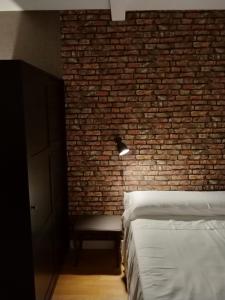 Katil atau katil-katil dalam bilik di Loft urban FK