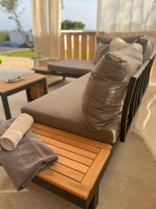 Ein Sitzbereich in der Unterkunft Vila Olson - Holiday Village Twins