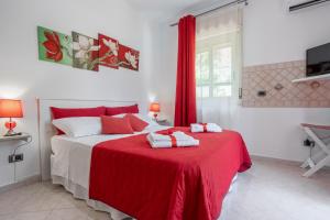 Ένα ή περισσότερα κρεβάτια σε δωμάτιο στο Villa Salvatore