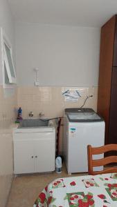 Kuchyň nebo kuchyňský kout v ubytování Hospedagem Franzoi