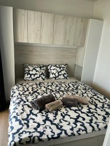 Ein Bett oder Betten in einem Zimmer der Unterkunft Vila Olson - Holiday Village Twins