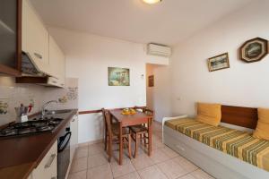 A kitchen or kitchenette at Villetta Grazia