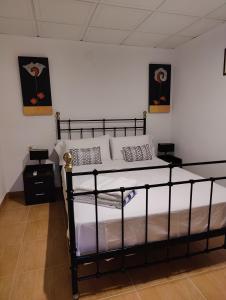 Postel nebo postele na pokoji v ubytování Casa Candelabro