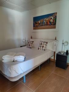 Postel nebo postele na pokoji v ubytování Casa Candelabro