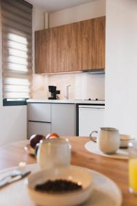 Kuchyň nebo kuchyňský kout v ubytování Nancy - Chara Apartments