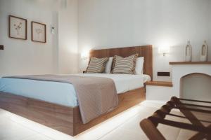 Postel nebo postele na pokoji v ubytování Nancy - Chara Apartments