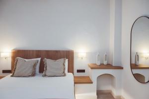 Postel nebo postele na pokoji v ubytování Nancy - Chara Apartments