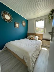 Postel nebo postele na pokoji v ubytování Villa LCSM et studio