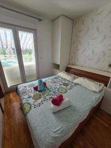 Posteľ alebo postele v izbe v ubytovaní Apartment Diana Split Znjan