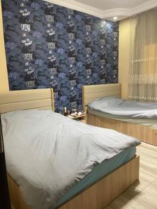 Postel nebo postele na pokoji v ubytování Modern-Chic Property for renting in Sheikh Zayed N2 - شقة أرضي بمدخل خاص- الشيخ زايد Family only