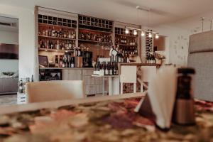 Nápoje v ubytovaní Hotel Willa Odkrywców