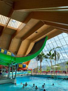 a group of people in a pool at a water park at Am Berg in Feldberg
