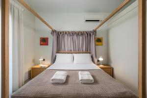 A bed or beds in a room at Elysium Seaview Oasis