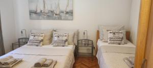 Ένα ή περισσότερα κρεβάτια σε δωμάτιο στο Apartman Campo