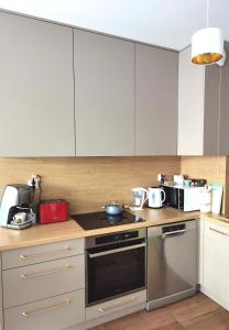 Kuchyňa alebo kuchynka v ubytovaní Apartament Olecko Centrum