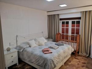 Krevet ili kreveti u jedinici u objektu Villa piscina privada MadreselvaSuite
