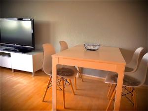 Un televizor și/sau centru de divertisment la Ferienhaus Margarete
