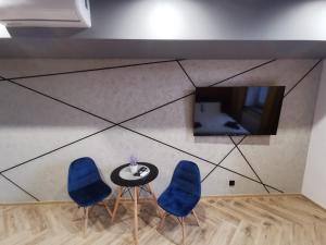 LOFT HOUSE APARTMENTS的电视和/或娱乐中心