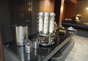 a blender on a counter in a room at Dastan Grand Hotel in Jalal-Abad