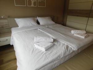 Tempat tidur dalam kamar di Zeleni Apartma
