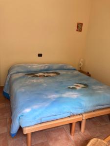 Postel nebo postele na pokoji v ubytování appartamento