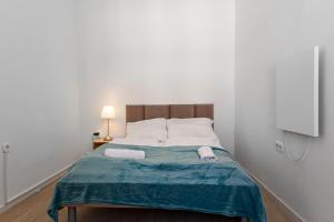 Postel nebo postele na pokoji v ubytování EasyStay 2BR Apt. connect with the whole City