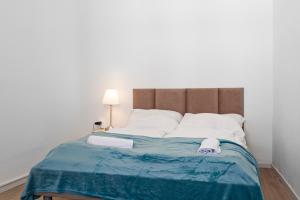 Postel nebo postele na pokoji v ubytování EasyStay 2BR Apt. connect with the whole City