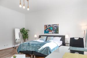 Postel nebo postele na pokoji v ubytování EasyStay 2BR Apt. connect with the whole City