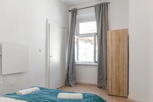 Postel nebo postele na pokoji v ubytování EasyStay 2BR Apt. connect with the whole City