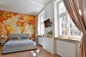 Posteľ alebo postele v izbe v ubytovaní Apartament Szeroka Old Town + 37 fotografií
