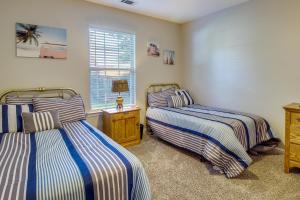 a bedroom with two beds and a window at Pet-Friendly Savannah Rental with Community Pool! in Savannah