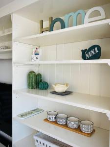 A kitchen or kitchenette at Residenza Gli Oleandri