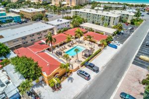 an aerial view of a city with a swimming pool at Upham Beach Inn - #3 Studio in St. Pete Beach