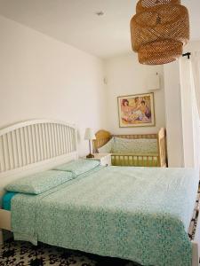 A bed or beds in a room at Residenza Gli Oleandri