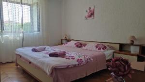 Postel nebo postele na pokoji v ubytování Apartman CELIJA