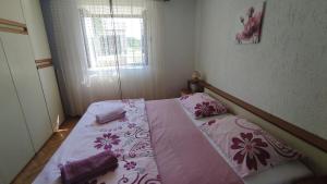 Postel nebo postele na pokoji v ubytování Apartman CELIJA