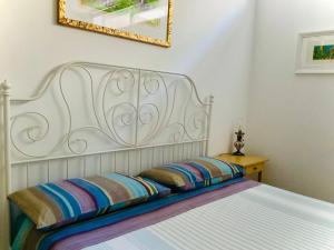 A bed or beds in a room at Residenza Gli Oleandri