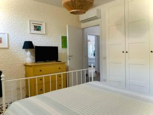 A bed or beds in a room at Residenza Gli Oleandri