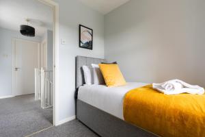 Ένα ή περισσότερα κρεβάτια σε δωμάτιο στο Chelmsford Reach 3 bed house near centre,free parking, Wi-Fi, table football +22 φωτογραφίες