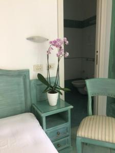 Istumisnurk majutusasutuses Albergo Olmitello - cucina vegetariana bio e tradizionale