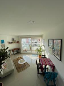 a living room with a couch and a table at Matilda apt - Feel at home in Barranquilla in Barranquilla